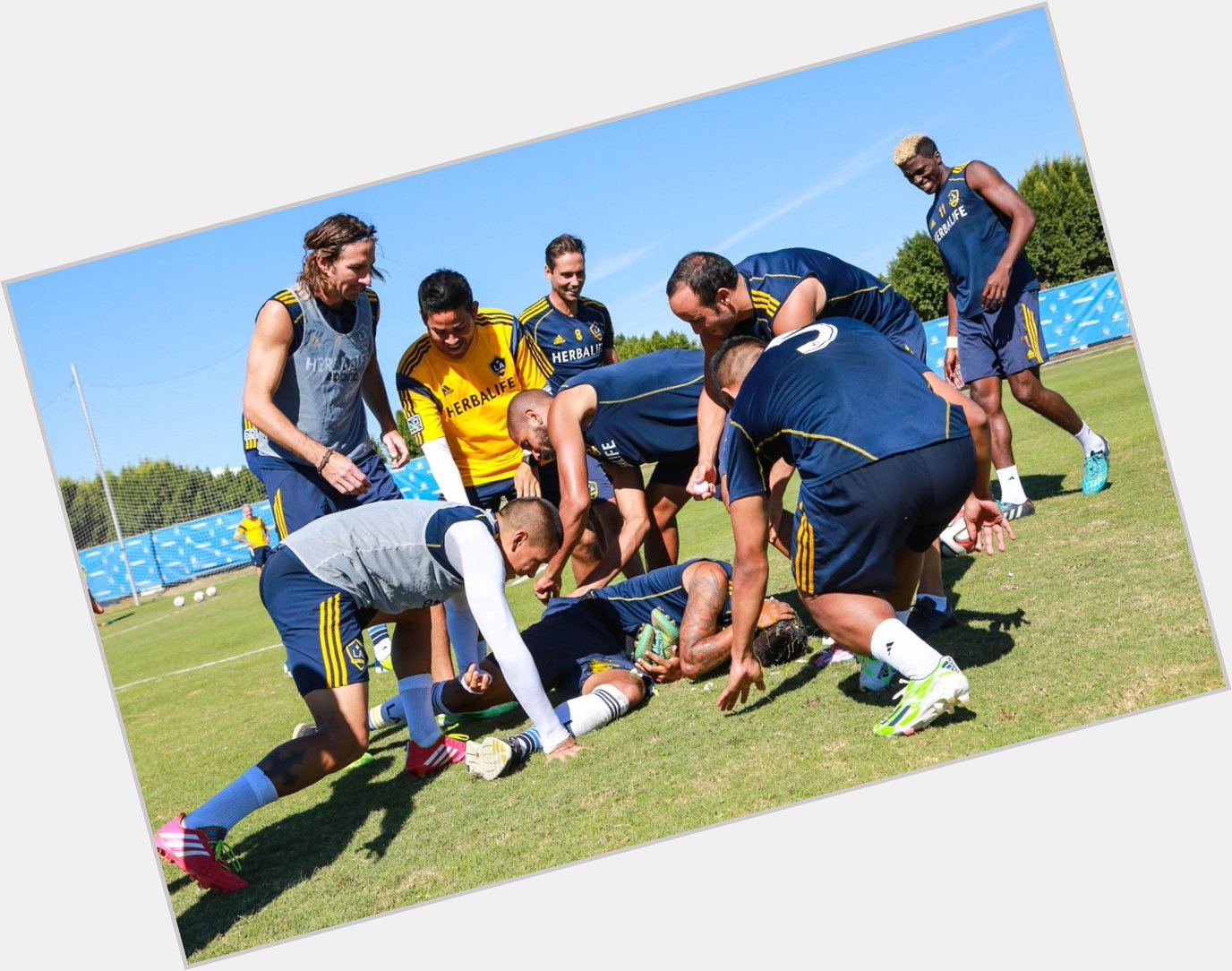 The wished a happy birthday with a very messy post-training prank: 

Watch:  