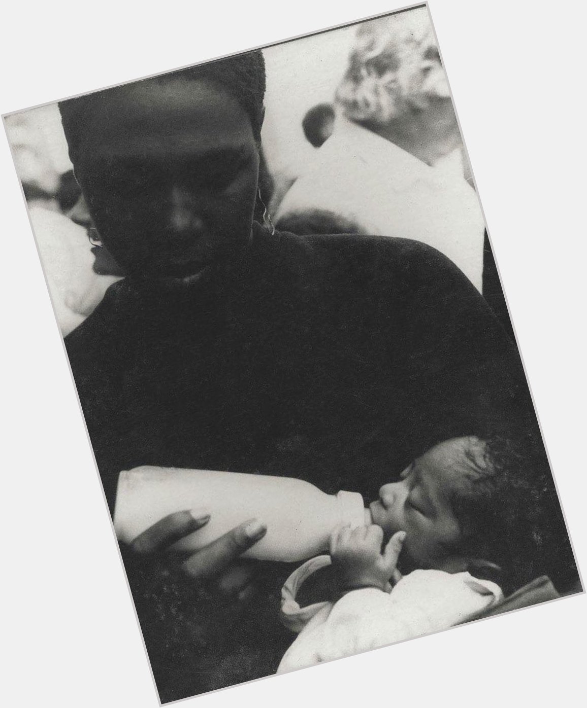 Afeni Shakur feeding a baby Pac. RIP and happy birthday, Afeni! | : Barbara Caress 