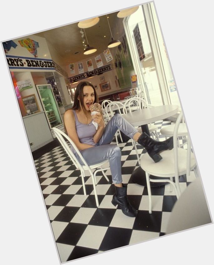 Happy birthday, Angelina Jolie! This ice cream shop vibe circa 1994 is our eternal summer mood. 