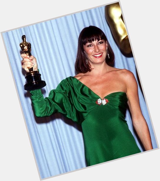 Happy birthday to Oscar winner Anjelica Huston and her forever iconic green dress designed by Tzetzi Ganev 