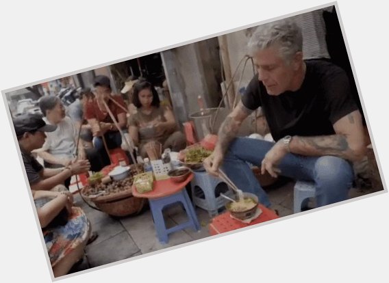   Bourdain happy birthday Plastic red chairs as favorite on the street. 