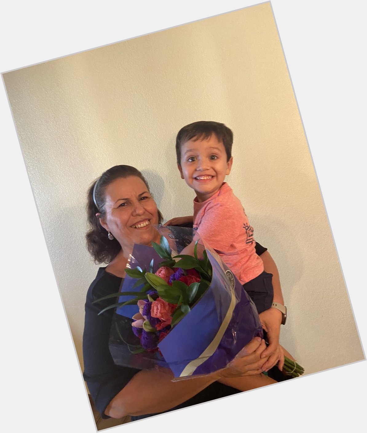 This Big Boy brought guela flowers for her birthday. Happy birthday guela!! We love you!!        