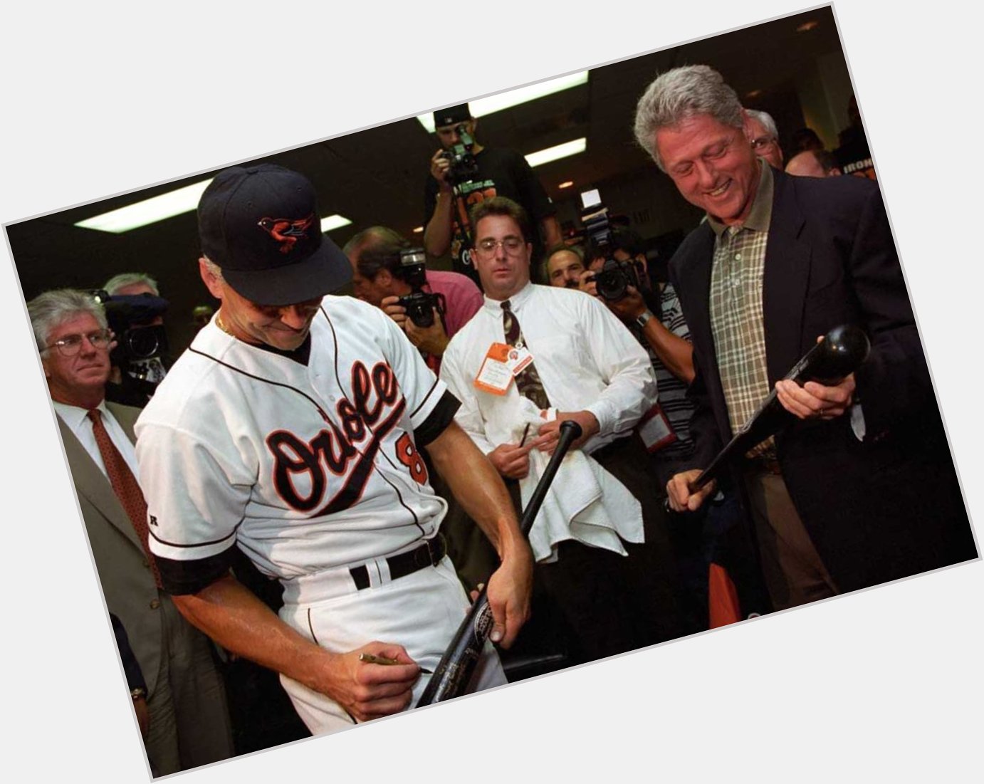 Happy birthday today to some guy named Ripken, signing an autograph for President Bill Clinton    