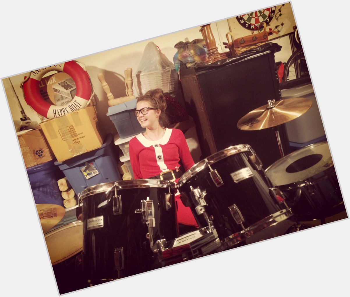  she got drums. Now what? She says \"happy birthday\" 