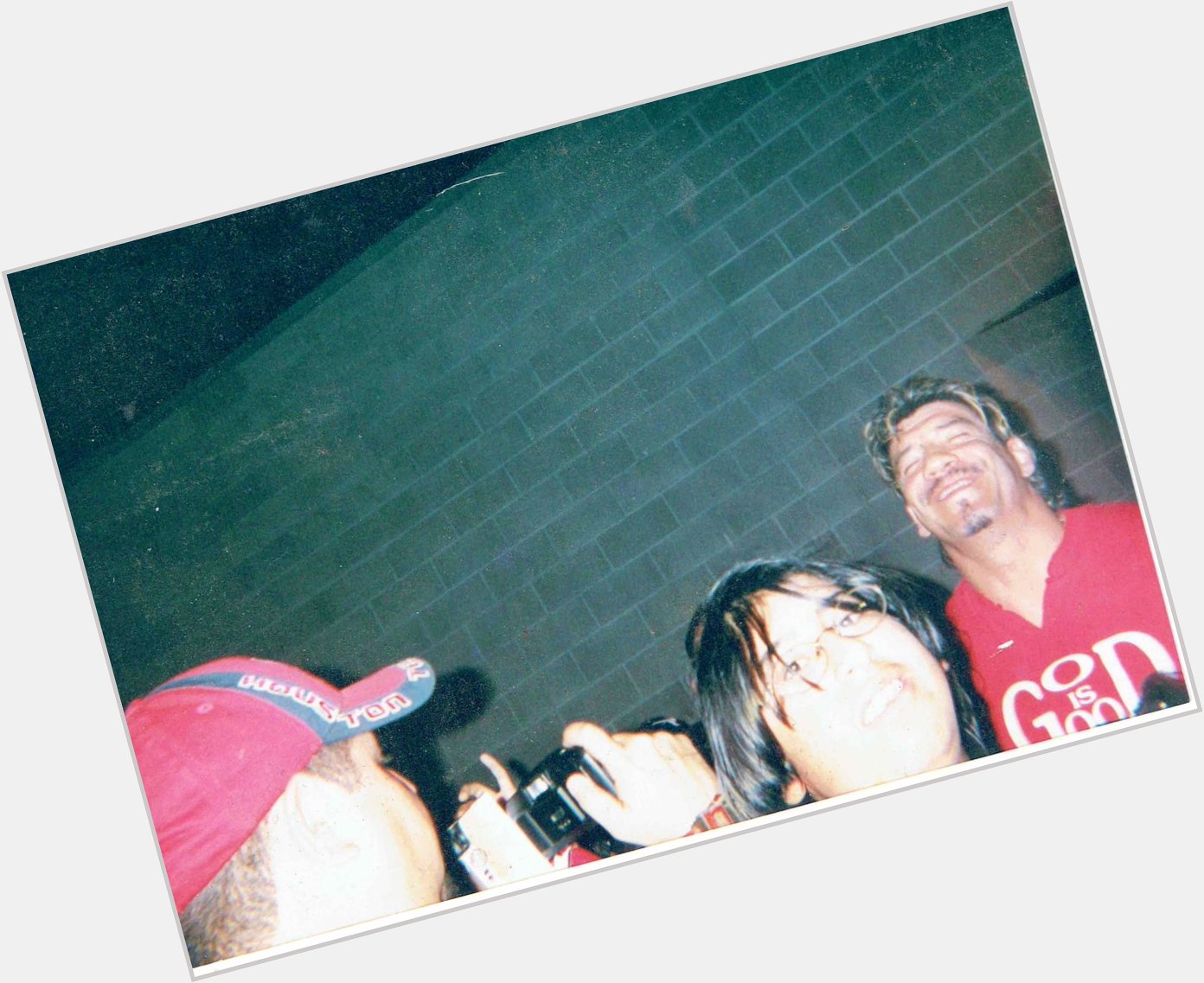 Happy birthday Eddie Guerrero. Photo I took of him in 2003, with my brother in front of him. 