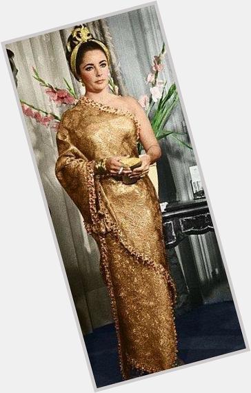 Happy Birthday Elizabeth Taylor

Photo: 1964 in Cristobal Gold Sari   