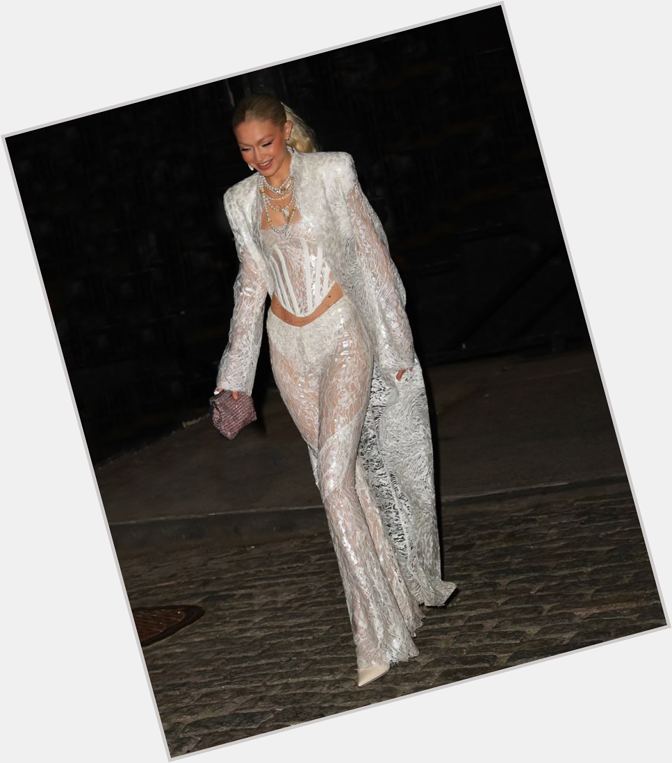 HAPPY BIRTHDAY GIGI HADID WEARING S22 SILICONE WAVE LACE FROCK COAT, CONTOUR CORSET + CONTOUR LACE PANT 