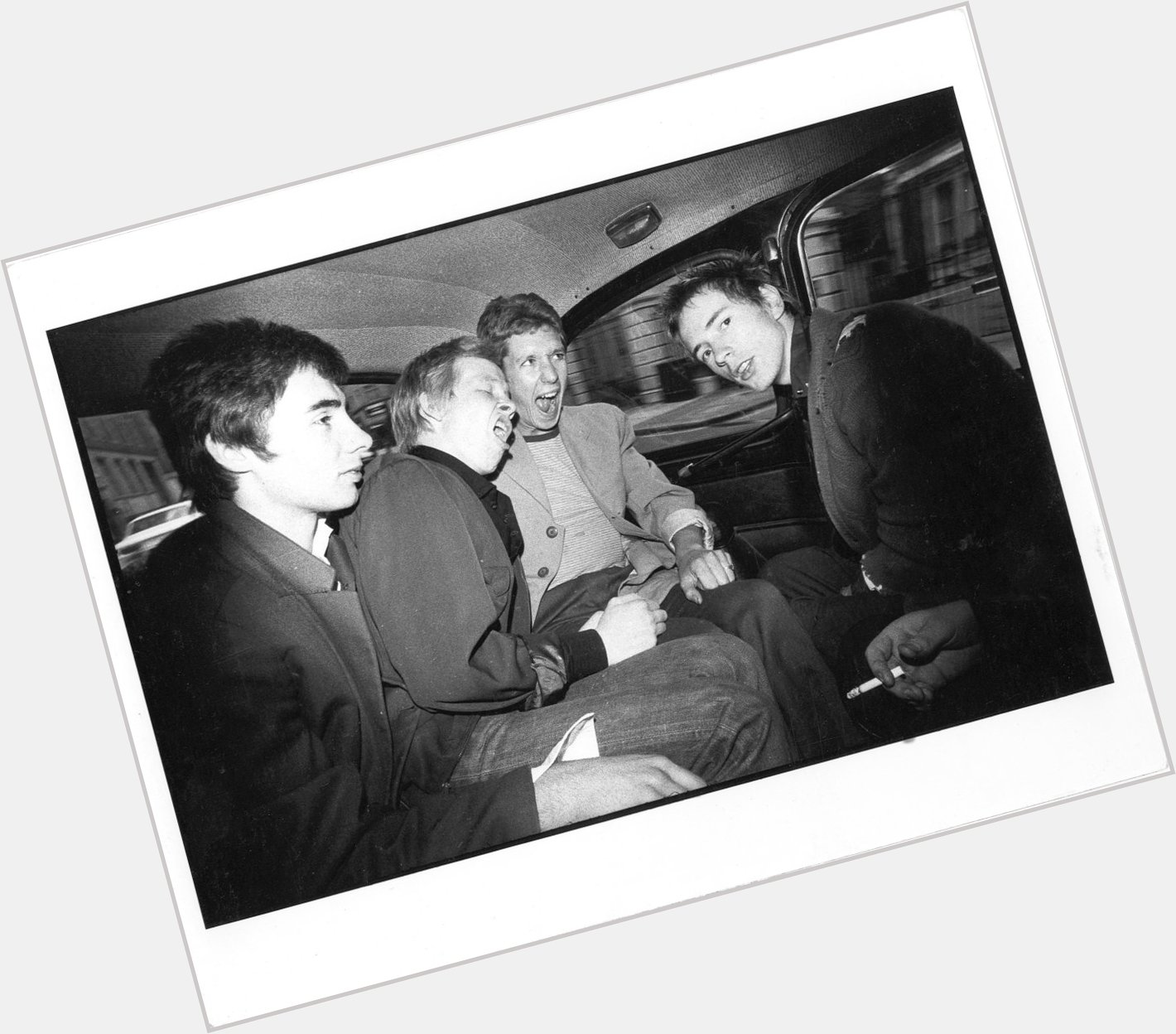 Happy birthday to Glen Matlock - pic by Stevenson, Sex Pistols in taxi, April 1976 