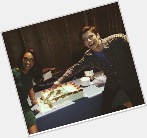 Here you can see a silly-looking Grant Gustin and Candice Patton murdering a cake. Happy Birthday  
