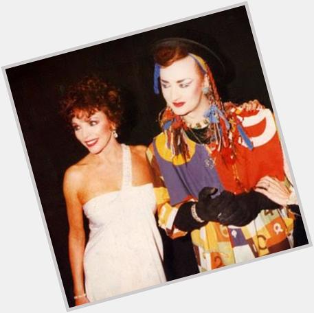 Happy 82nd Birthday Joan Collins! Seen here with a drag queen friend ...wait, it\s just Boy George!! 