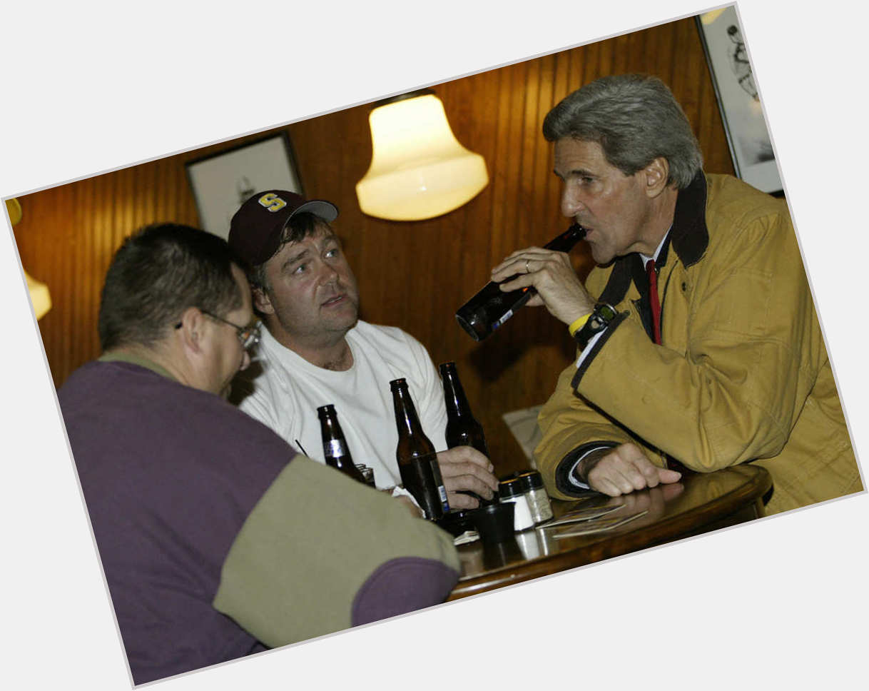 Happy Birthday American politician John Kerry (Dec. 11, 1943- ) 3 days before the election in 2004 at a bar in Iowa. 