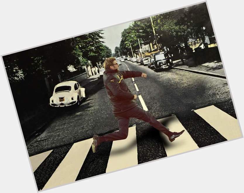 Crossing Abbey road Klopps way.   happy birthday John Lennon 