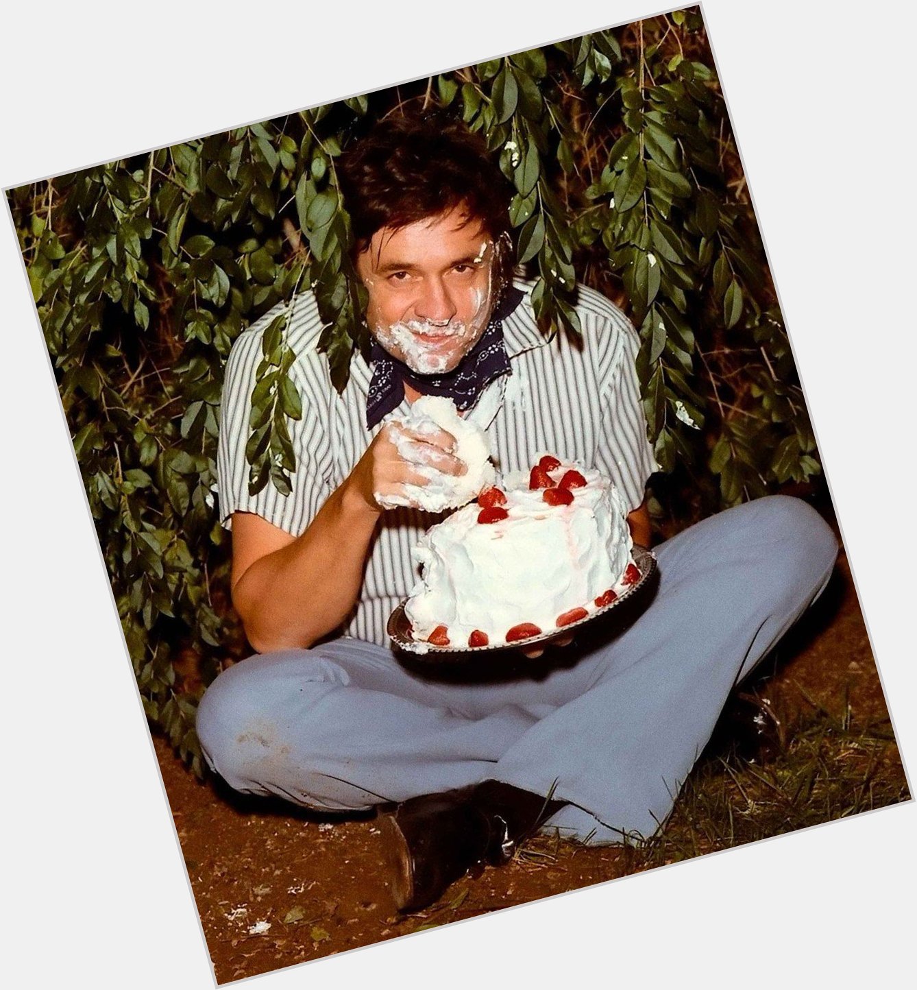 Happy birthday to Johnny Cash and also to this photo of Johnny Cash eating birthday cake on the ground 