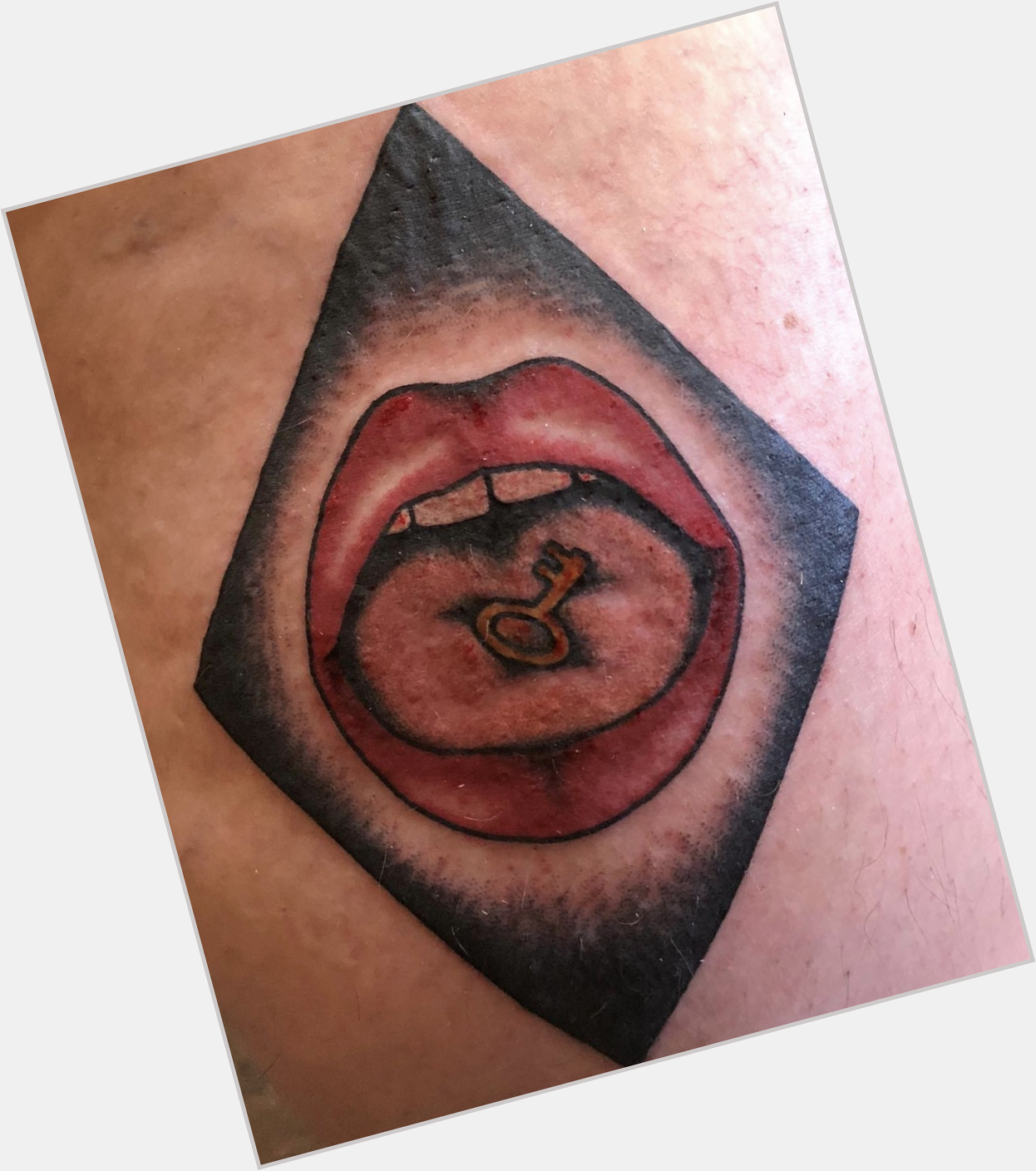 Happy birthday to kate bush my favorite singer of all time whose mouth I have tattooed on my leg 