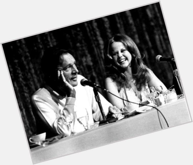 Linda Blair (Happy Birthday) with Richard Burton at press conference for EXORCIST II: THE HERETIC. 