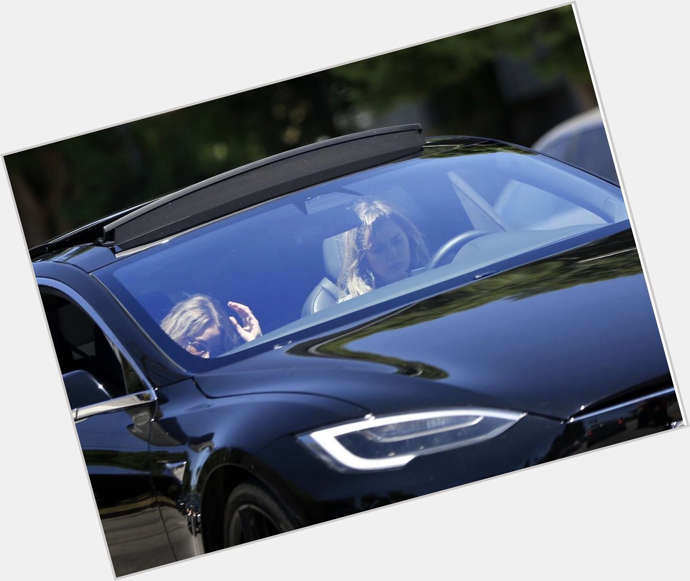 Lookin good in your Tesla Model S......hope you have a Happy Birthday today Miley Cyrus!!!     
