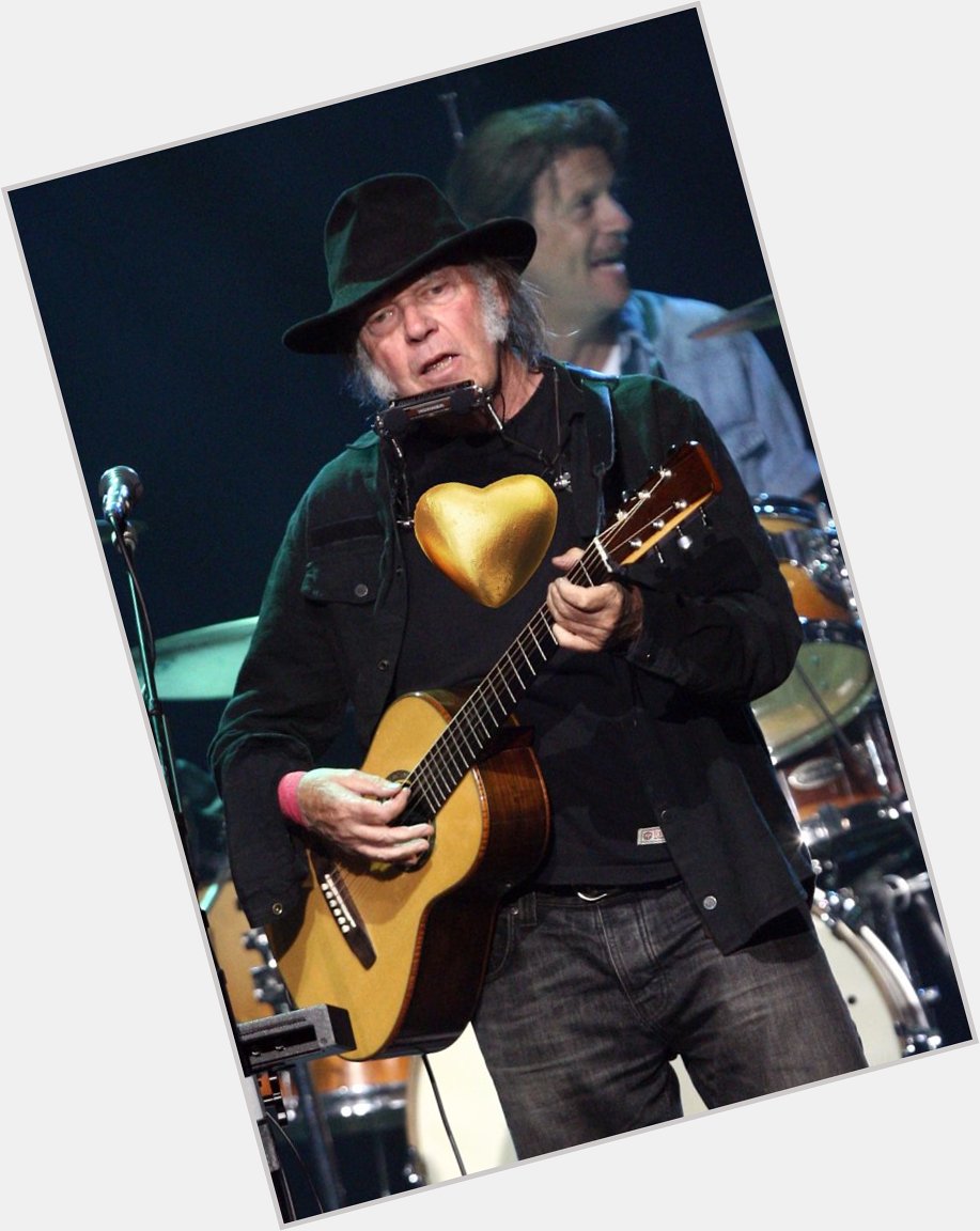 His gold heart is still shining through at 70! Happy Birthday Neil Young!  