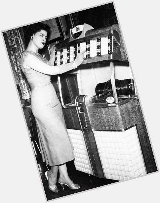 Happy Birthday, Patsy Cline. Check out the singer here in front of an AMI Jukebox. 