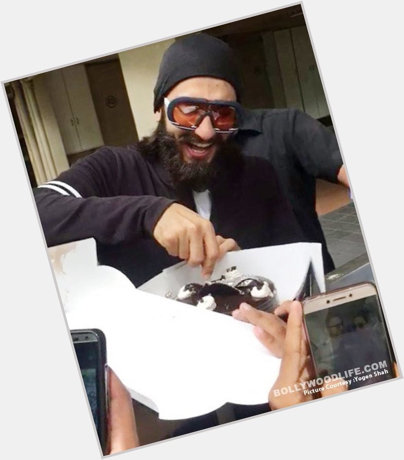 Ranveer Singh looks really happy to cut his birthday cake with his fans view HQ pics  
