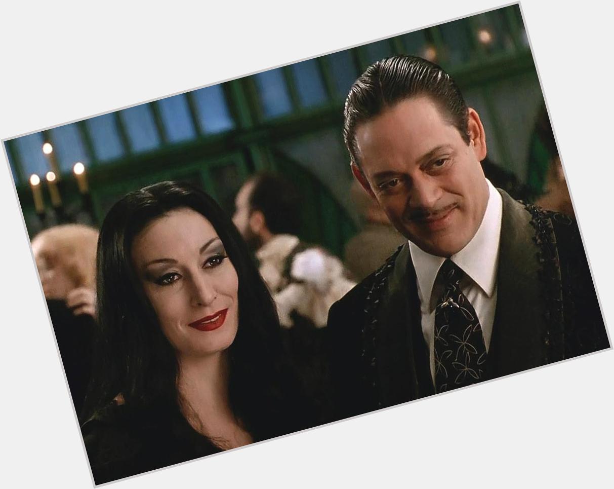 Happy birthday, Raul Julia! (Mar 9, 1940 - Oct 24, 1994)
As Gomez with Morticia in \The Addams Family\ movie (1991). 
