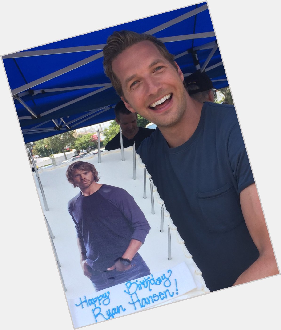 A big birthday smile! Who doesn\t love a cake with someone else\s face on it?!! Happy Birthday Ryan Hansen! 