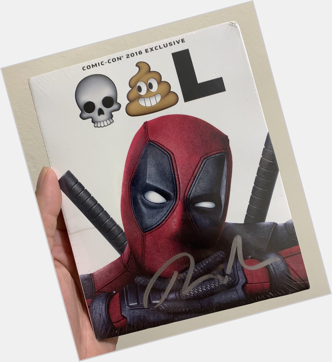 2016 SDCC Exclusive Deadpool Blu-Ray, signed by Ryan Reynolds.  Belated happy birthday! 