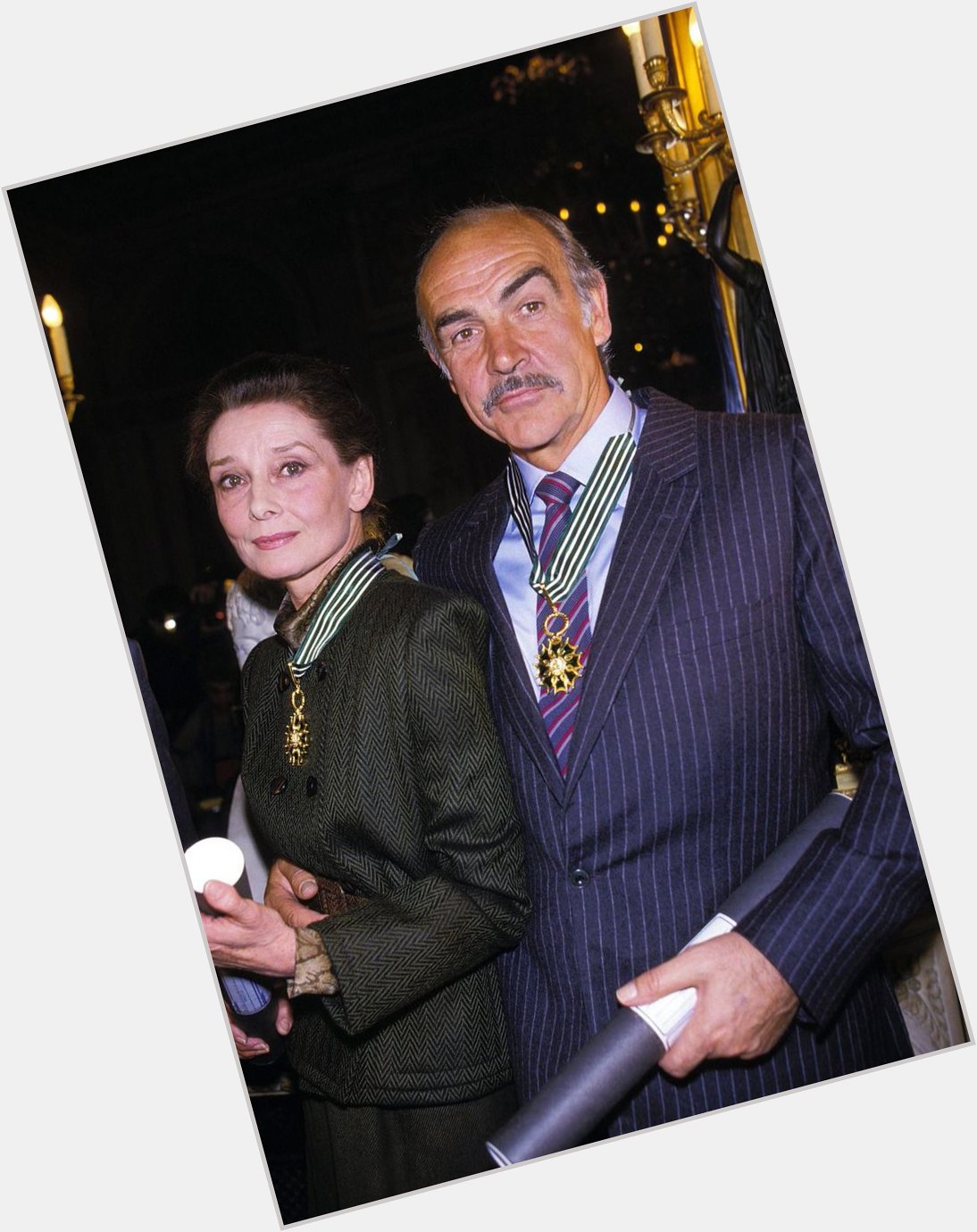 Happy Birthday, Sean Connery! Connery photographed with Audrey Hepburn at a Paris awards show, 1987 