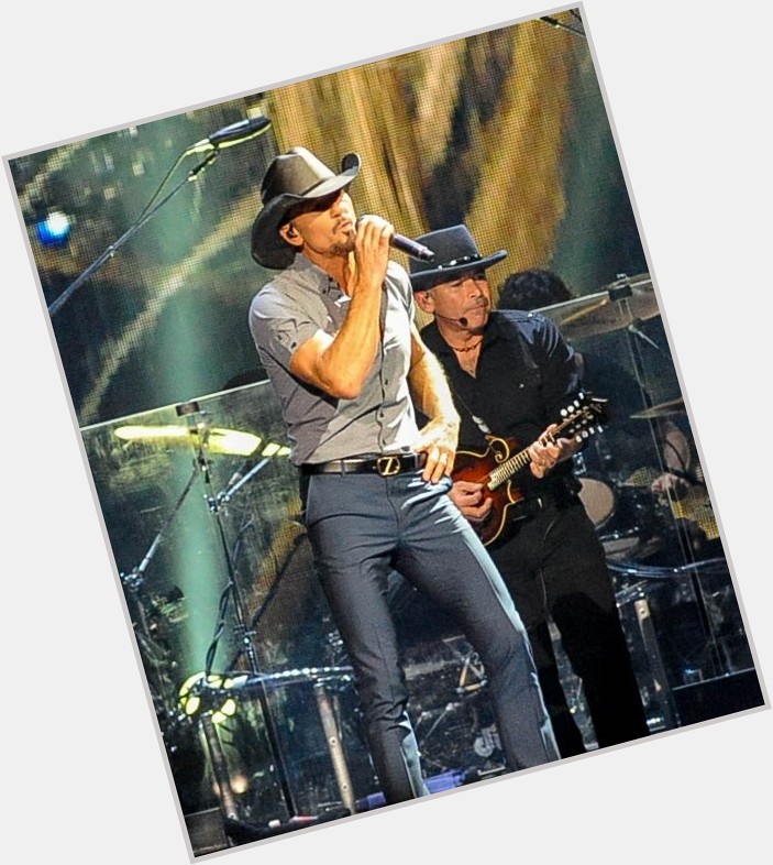 56 and still looking great!!! Happy Birthday ! What\s your favorite Tim McGraw song? 