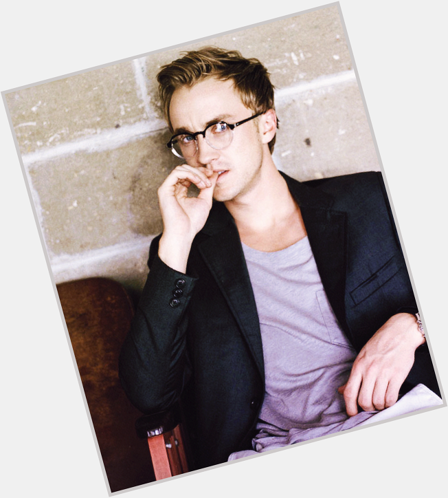 Happy Birthday to the star Tom Felton. What do you think of the round frame glasses he is wearing here? 