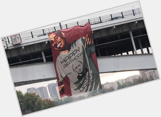 Banner on Moscow bridge shows Obama wishing happy birthday to global daddy Vladimir Putin
 