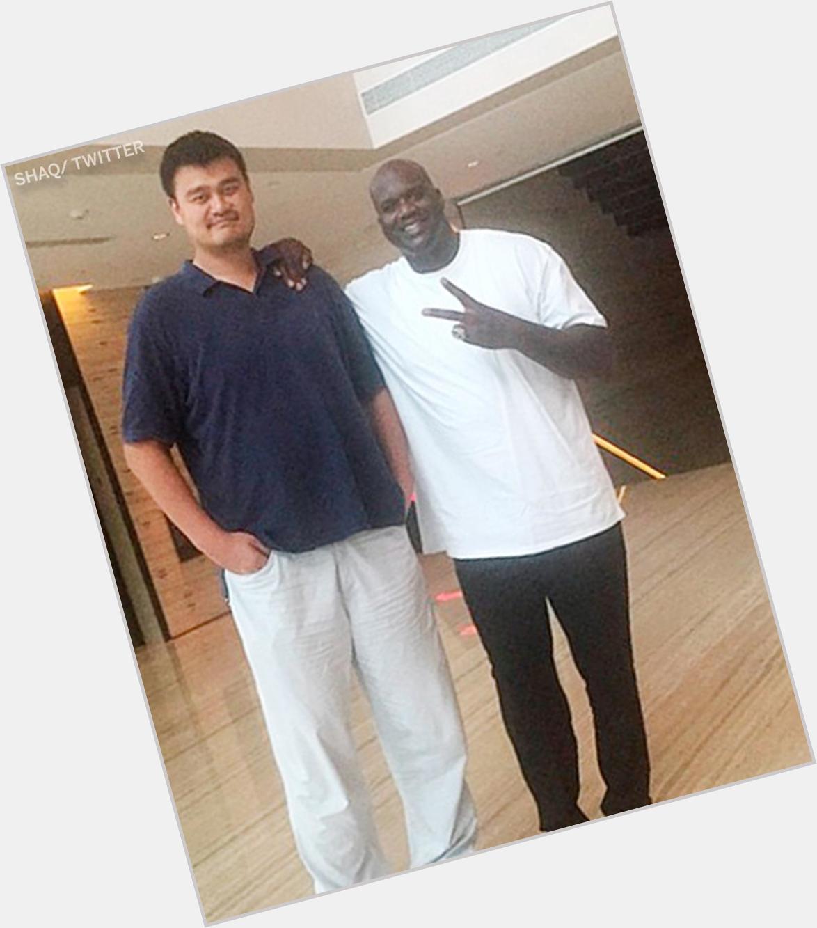 Everyone looks small compared to Yao Ming. 

Happy Birthday to the 7\6\" legend. 
